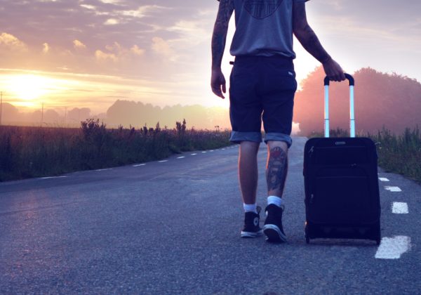Man goes on vacation with luggage